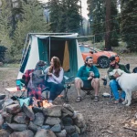 friends enjoying outdoors with dog