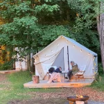 Wall tent glamping in the forest