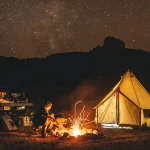 hot tent setup for camping around campfire with safety measures