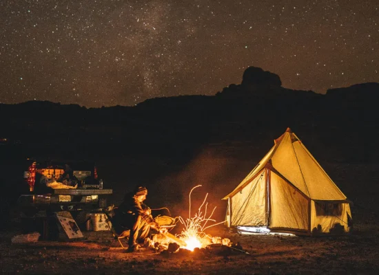 hot tent setup for camping around campfire with safety measures