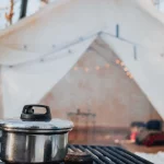 canvas tent setup in snow for hot tent camping