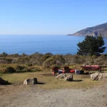 Oceanfront campsite at Northern California beach campground with picnic area and scenic coastal views