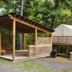 elevated-glamping-tent-wooden-deck-forest