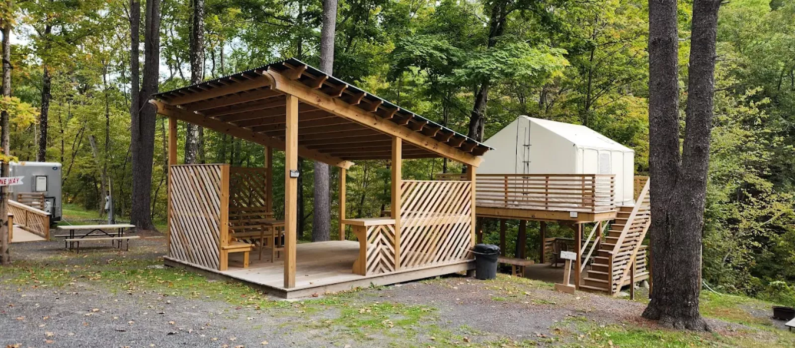elevated-glamping-tent-wooden-deck-forest