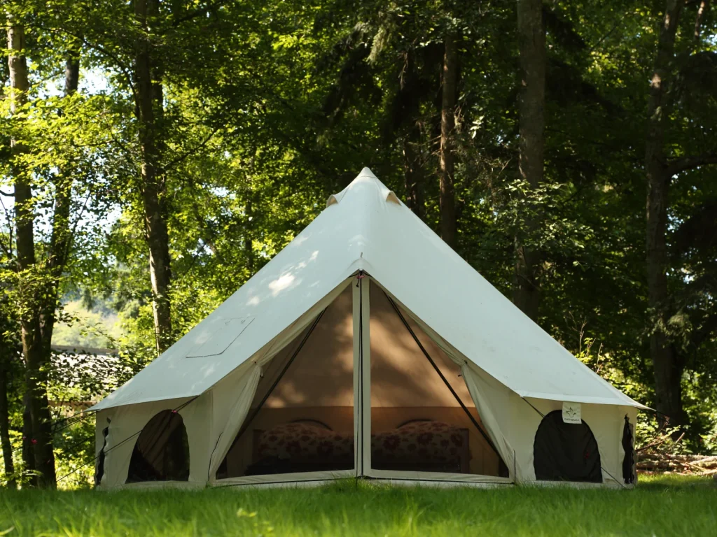 avalon bell tent setup in forest