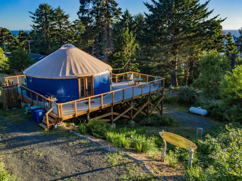 Booking the Otter Rock Surf Yurt in Oregon for an oceanfront stay. [Photo: Otter Rock Surf Yurt Google Profile]